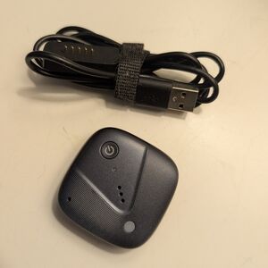Black Wireless Device with USB Cable